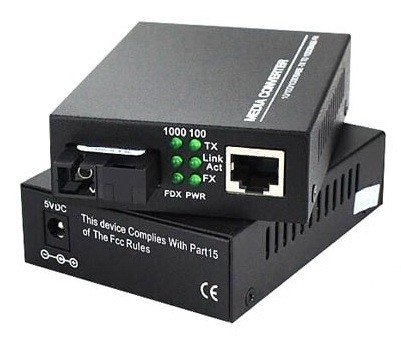 זוג ממירי מדיה 10/100/1000Base-TX ל-1000Base-FX, חיבורי RJ45 ו-SC בודד, תומך WDM להעברת תקשורת על סיב בודד SM עד 20 ק"מ, איכותי TopX